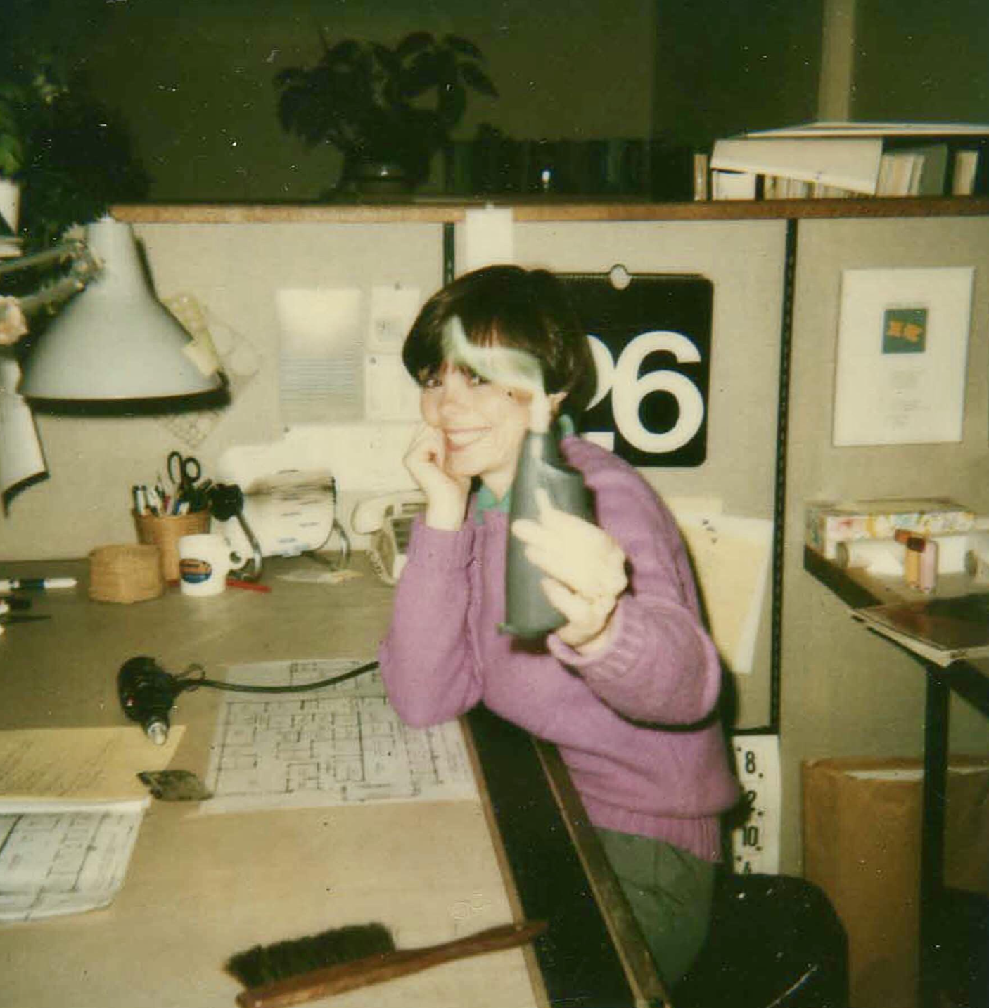 “At my drafting table with my electric eraser before our office used computers, 1984.”